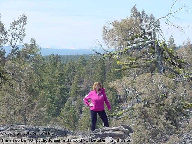 I scrambled up the rock outcropping at the top of this land and found such beautiful views across the Winema National Forest, all the way to the Cascase Mountains! I could see for miles up here! My job doesn